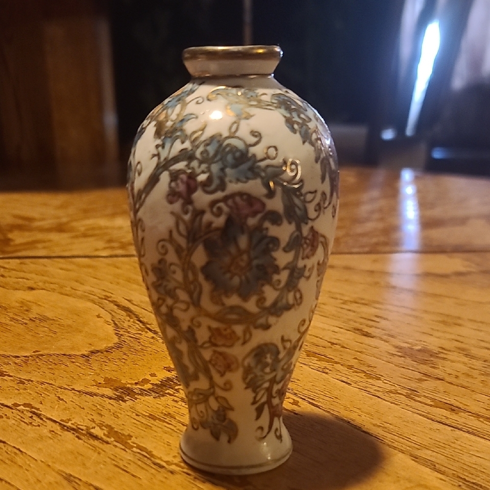Blue and Gold Decorative Vase with Intricate Floral Pattern